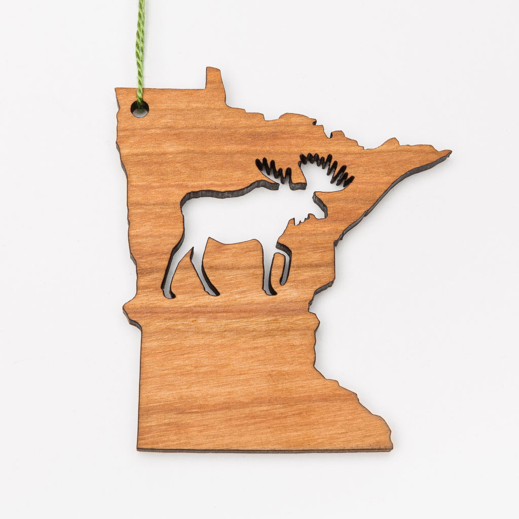 Laser cut moose in the middle of a wood Minnesota-shaped ornament