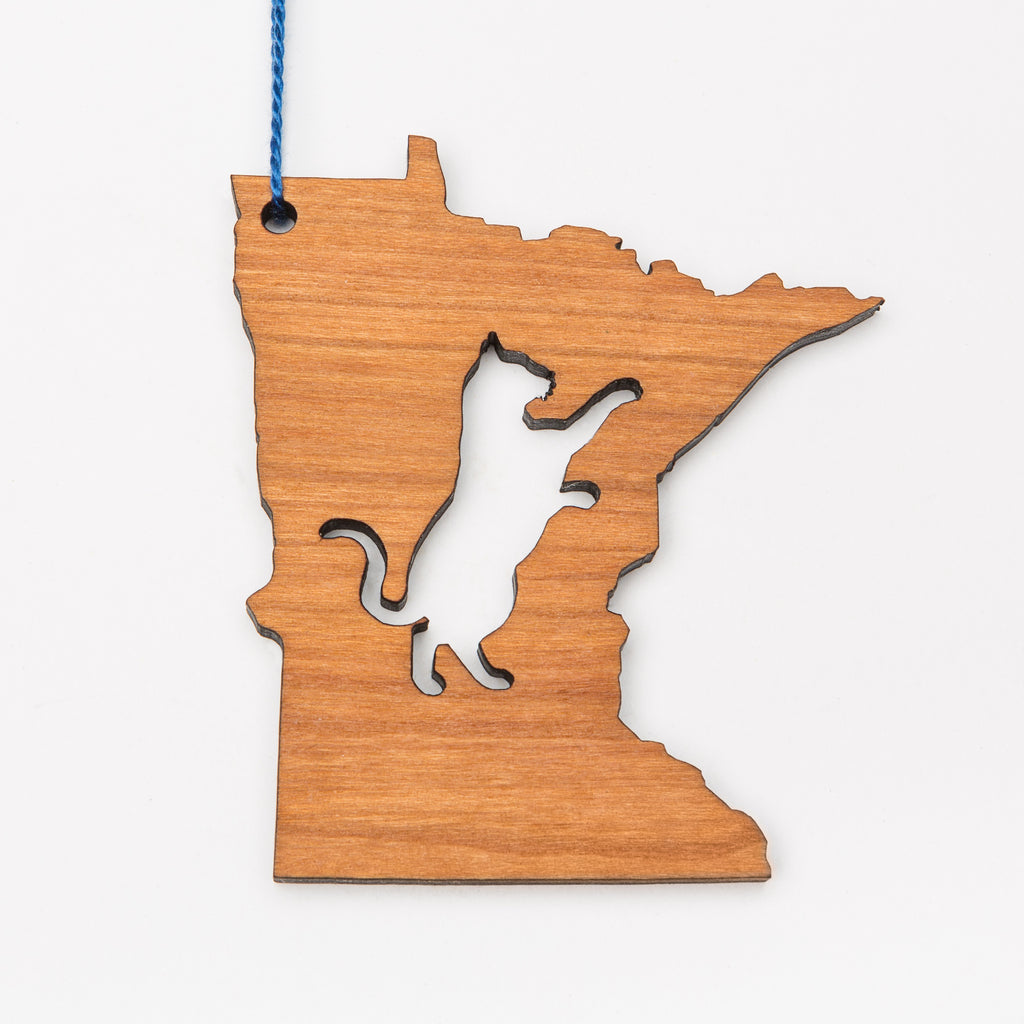 Laser cut wood ornament or magnet in the shape of Minnesota with a cat cut out in the center